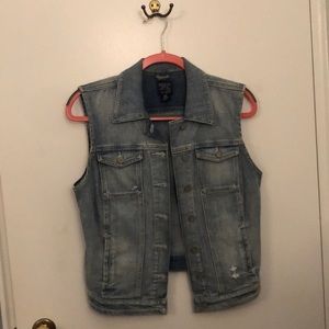 Distressed denim vest